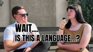 Jeff Turner and Tyra sit outside in conversation about art and self-care. Tyra speaks while holding a microphone, sunlight on both of them.