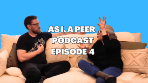 Jeff Turner hosting Episode 4 of the As I, A Peer Podcast, sitting on a couch interviewing Carlotta Smith about resilience and lived experience.