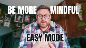 Jeff Turner wearing glasses and a plaid jacket looking at the camera with bold text reading "BE MORE MINDFUL EASY MODE".